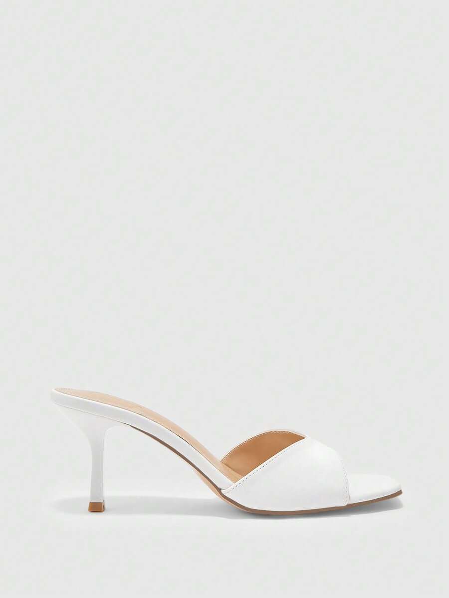 Women's black square toe high heel sandals featuring an open toe design, thin stiletto heel, and slingback strap.