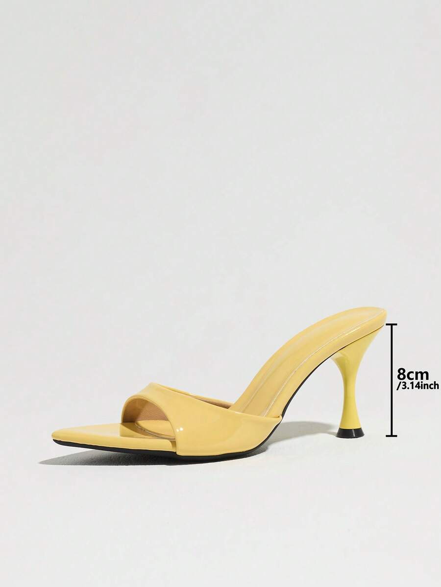 Women's open pointed toe stiletto mule high heel sandals featuring a glossy slip-on design.