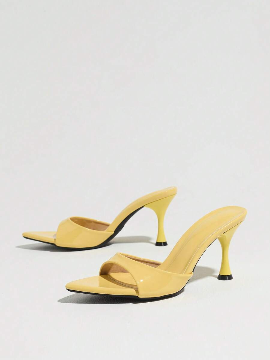 Women's open pointed toe stiletto mule high heel sandals featuring a glossy slip-on design.