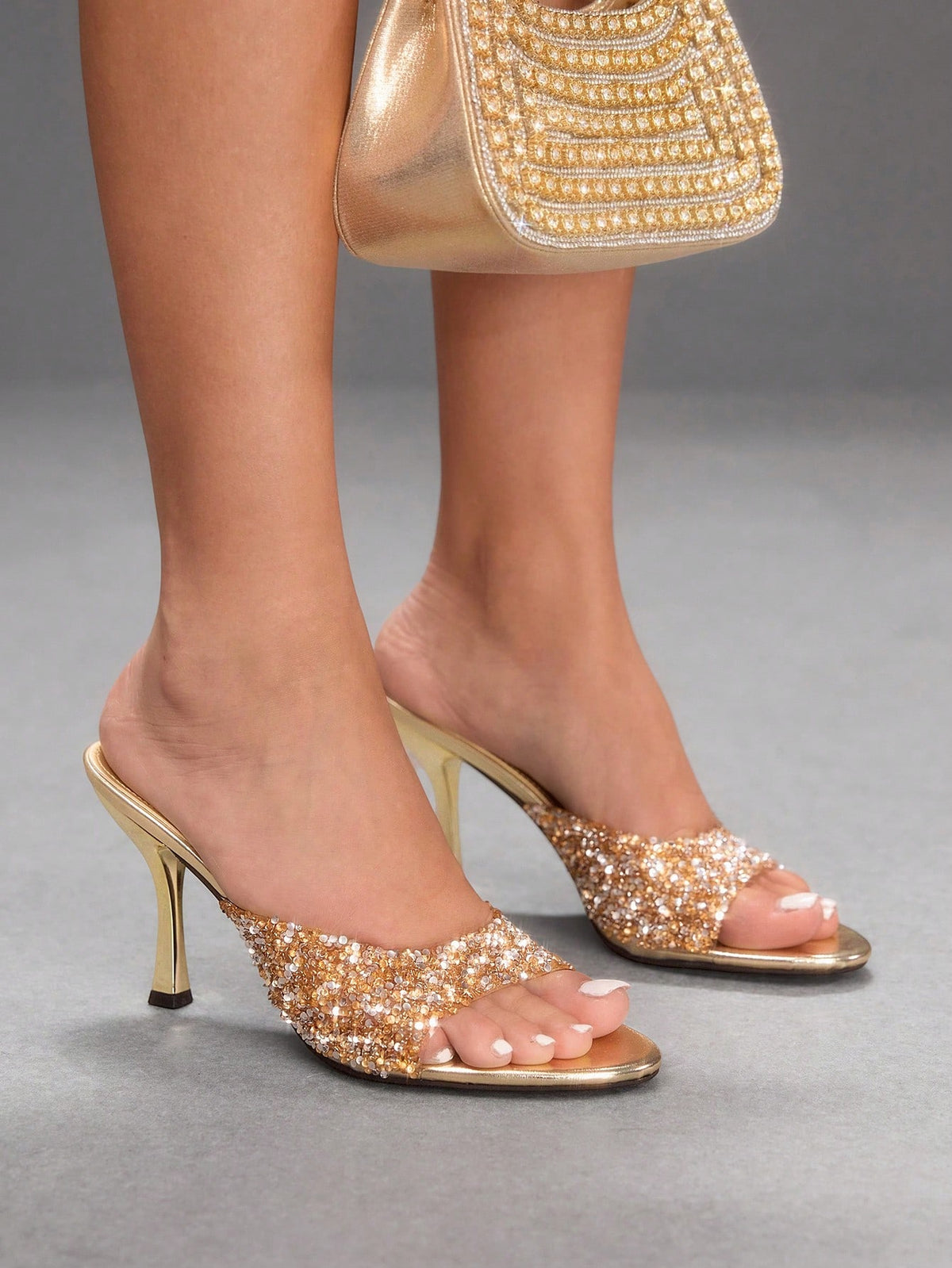 Women's open toe high heel sandals with slingback strap and sleek stiletto heel in smooth PU leather.
