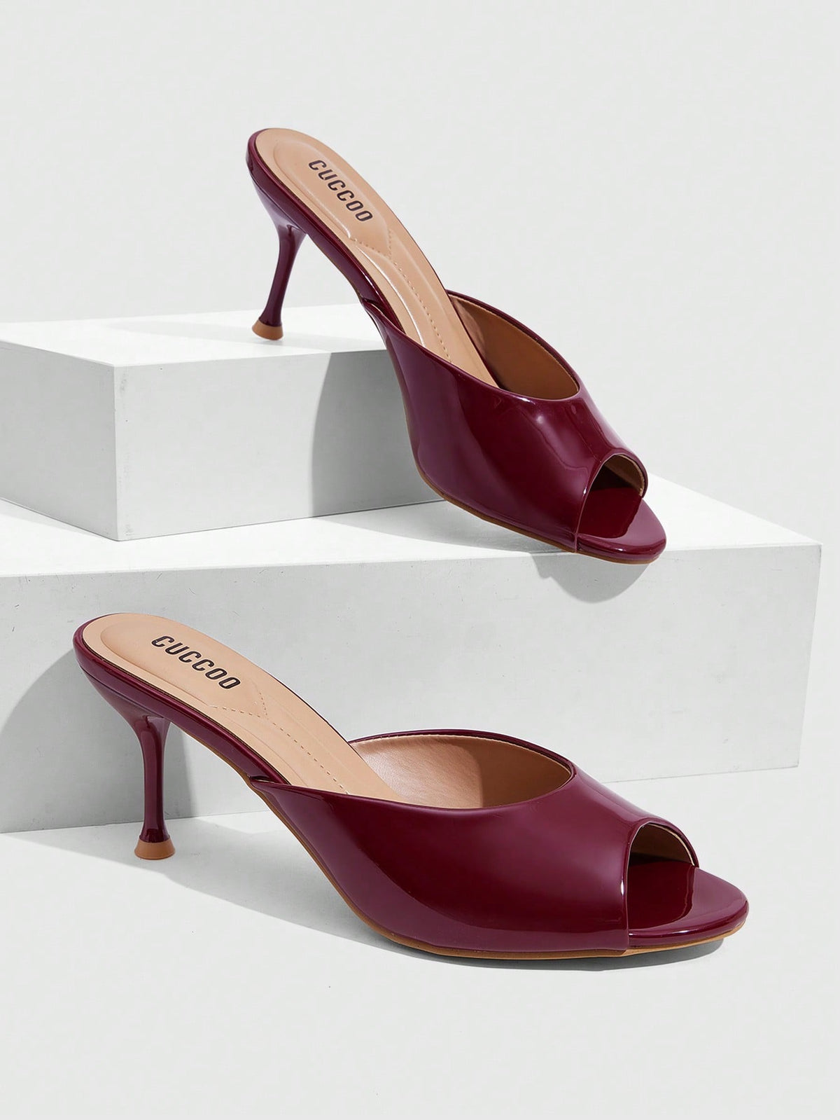 Pair of women's open toe high heel slingback sandals made with smooth PU leather