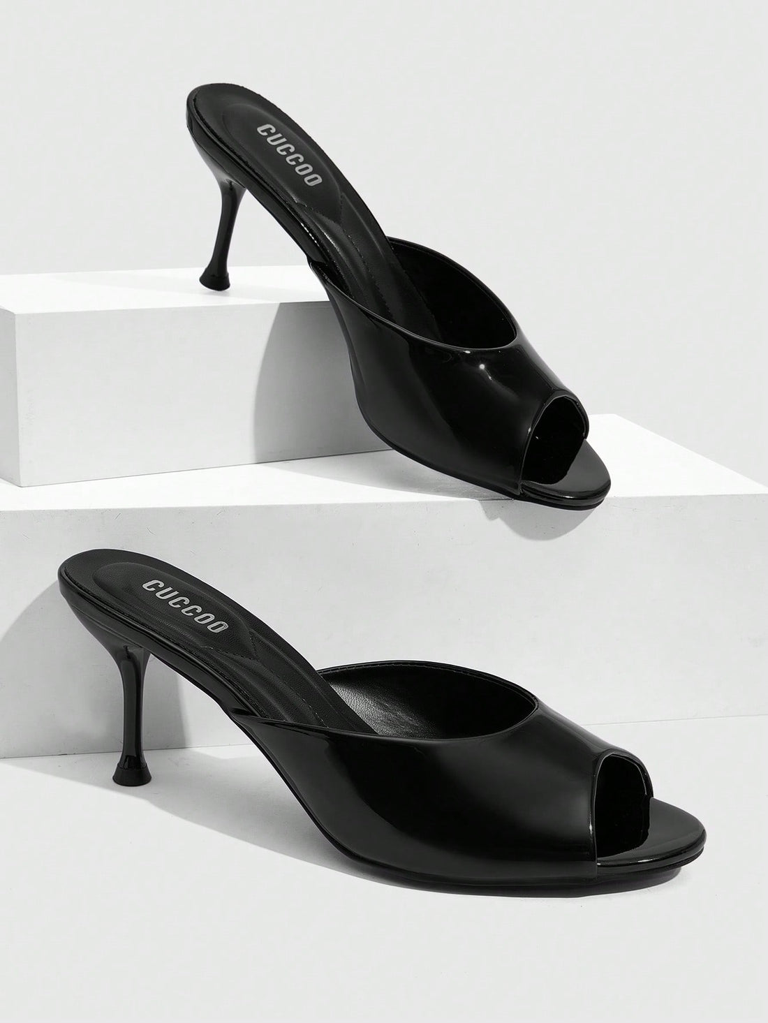 Pair of women's open toe high heel slingback sandals made with smooth PU leather