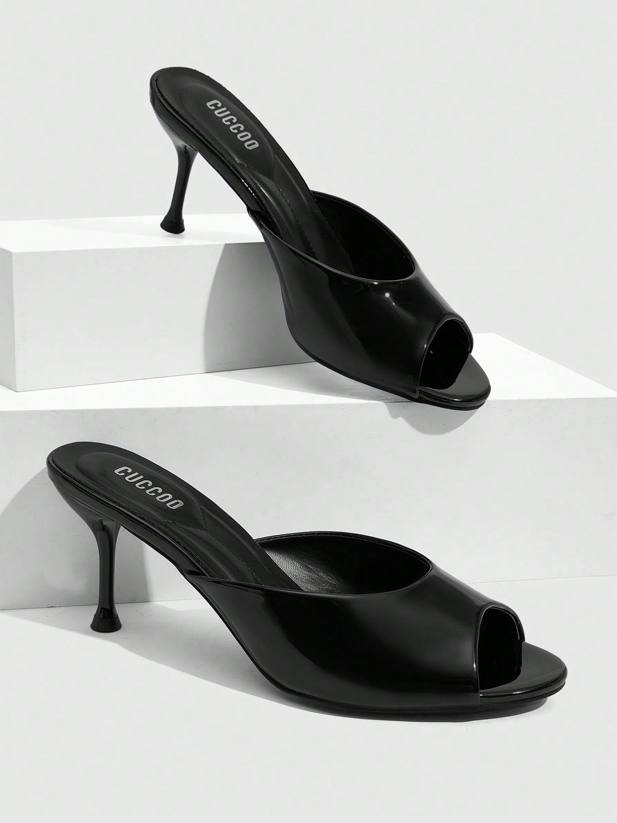 Pair of women's open toe high heel slingback sandals made with smooth PU leather