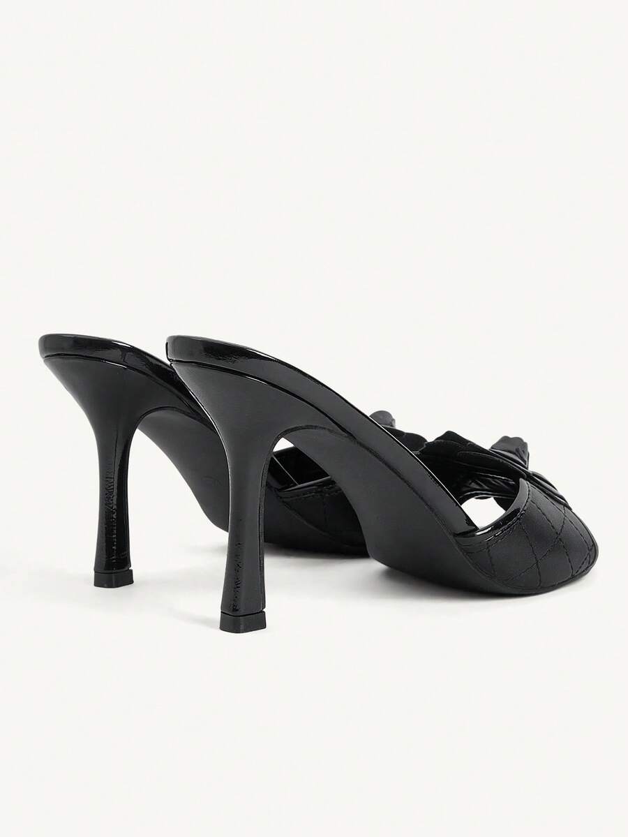 Women's golden snake pattern pointed toe thin heel strap sandals with three-dimensional camellia accent