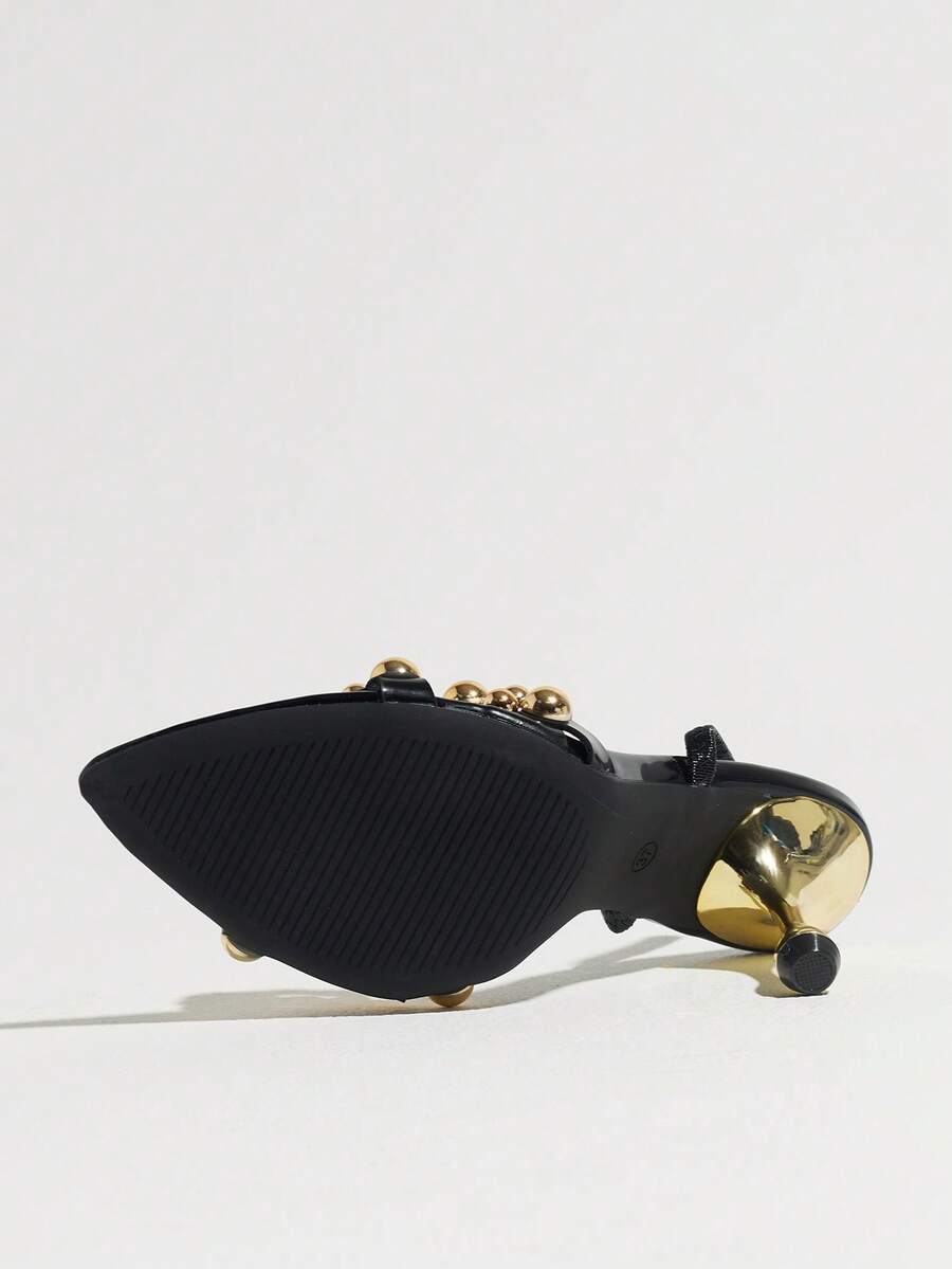 Pointed toe party high heels in gold featuring wavy lace trim, a stiletto heel, and back tie slingback straps.