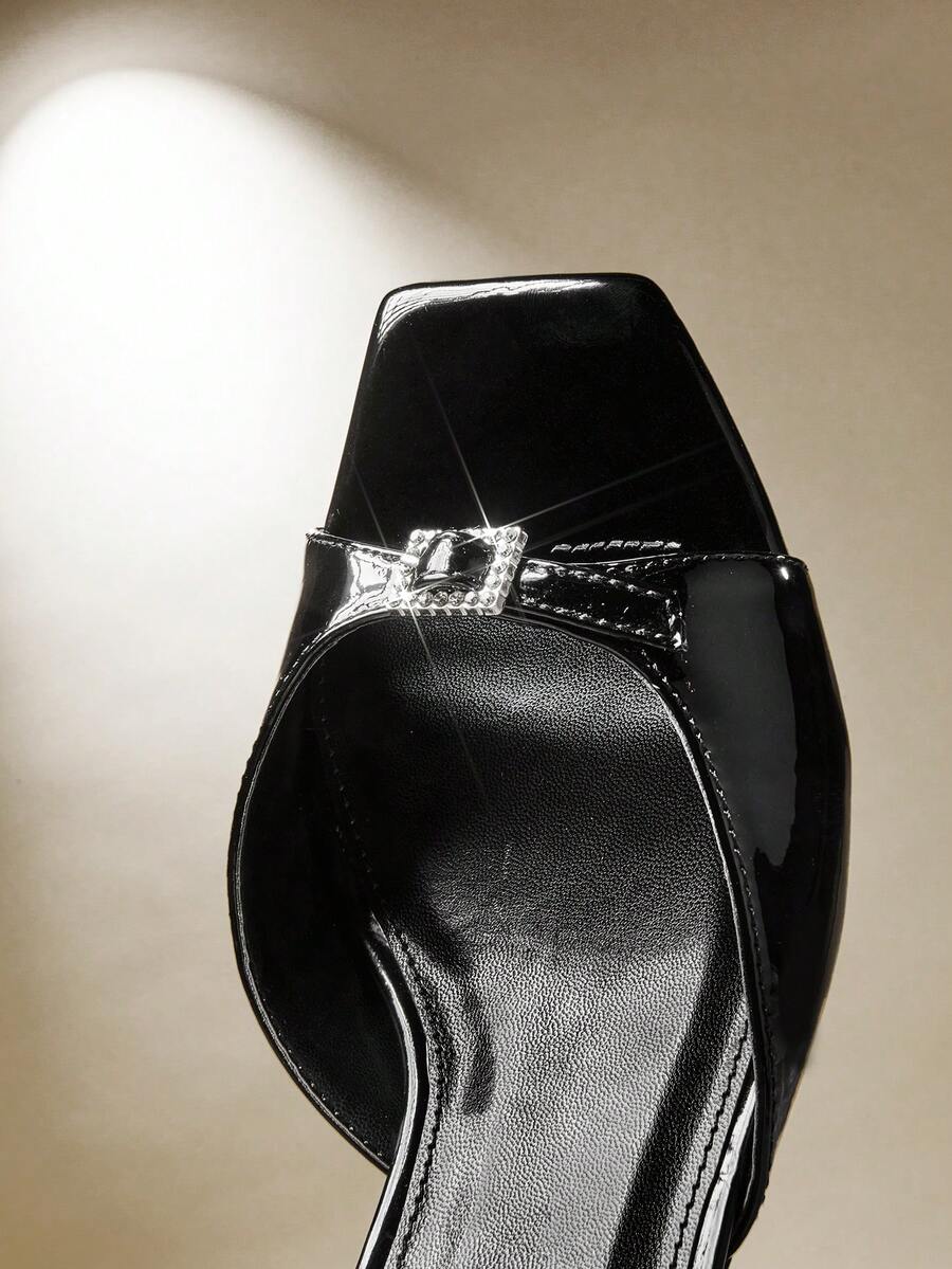 Women's pointed toe stiletto high heel wedding shoes featuring an elegant silhouette and glossy finish.