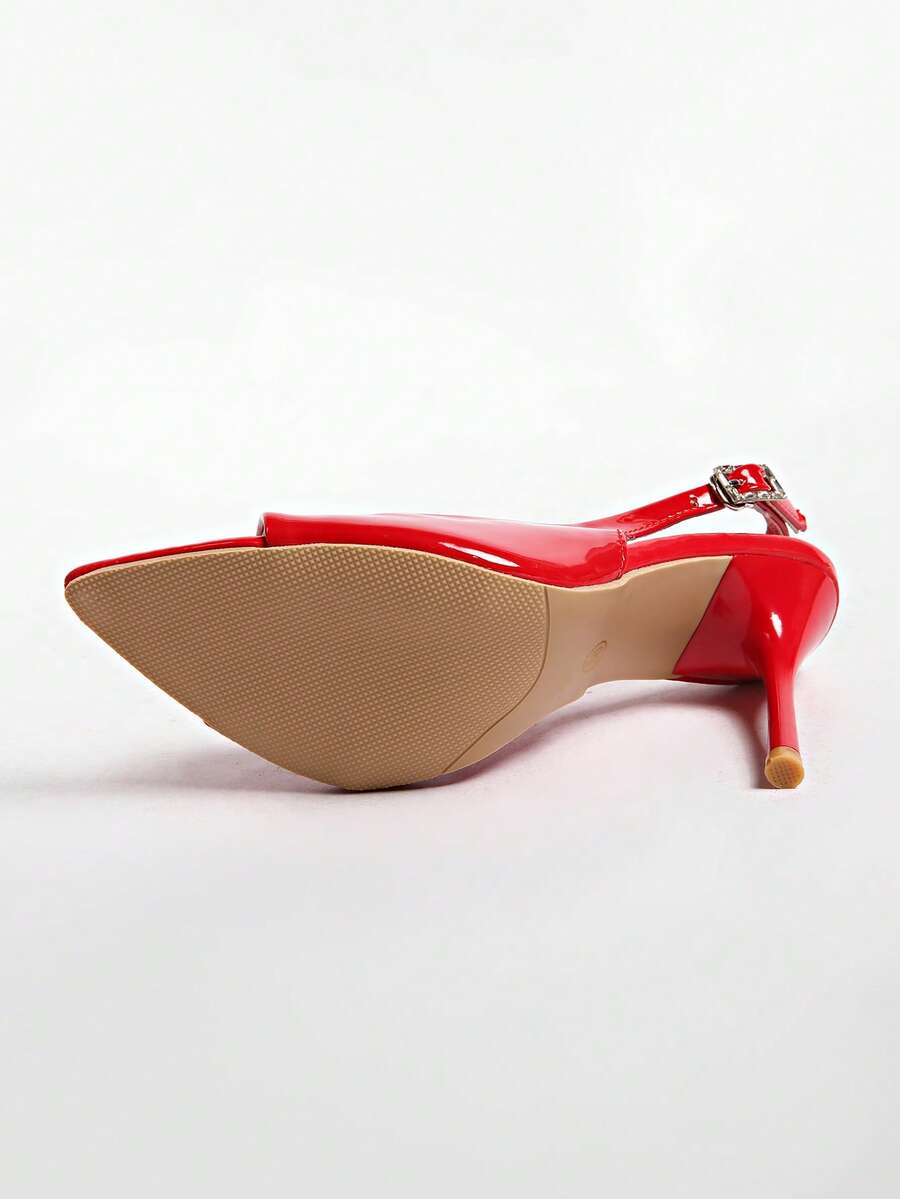 Pointed toe stiletto high heel pumps with sleek low vamp and sparkling rhinestone buckle slingback strap