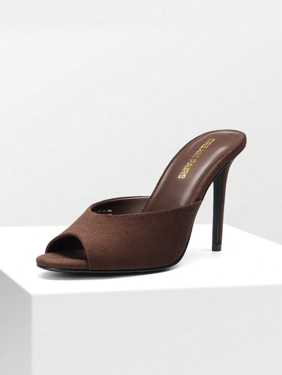 Women's peep toe stiletto mule sandals in white featuring a sleek high heel and slip-on design for party and wedding wear.