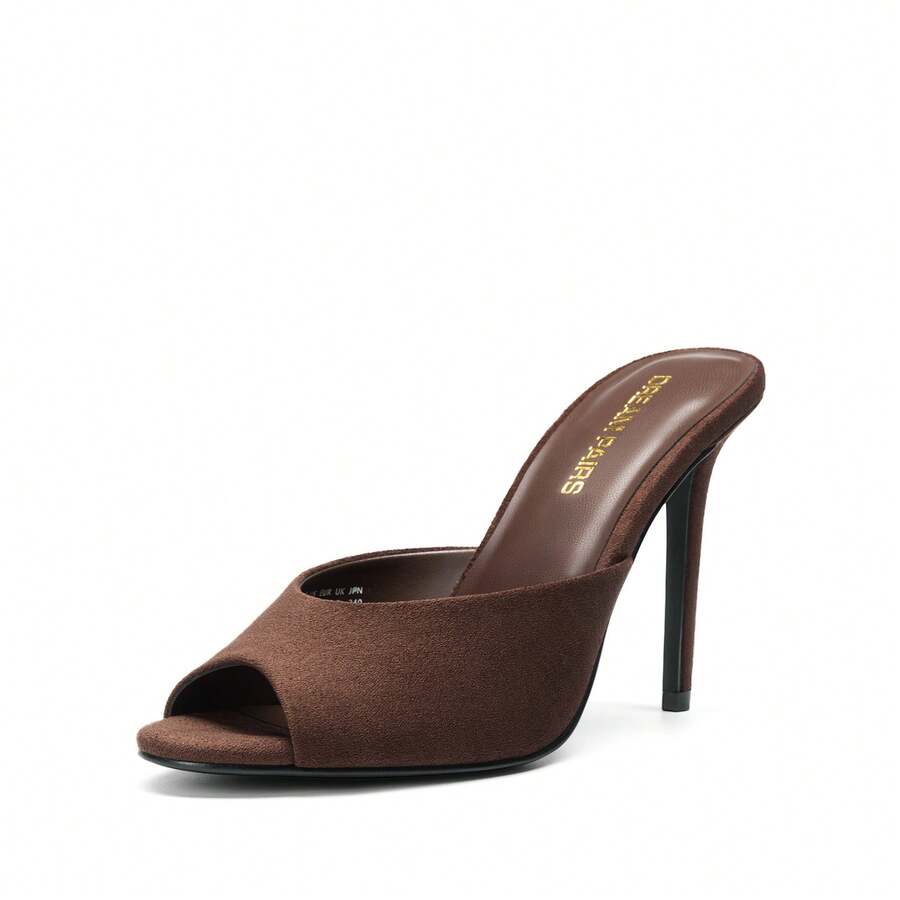 Women's peep toe stiletto mule sandals in white featuring a sleek high heel and slip-on design for party and wedding wear.
