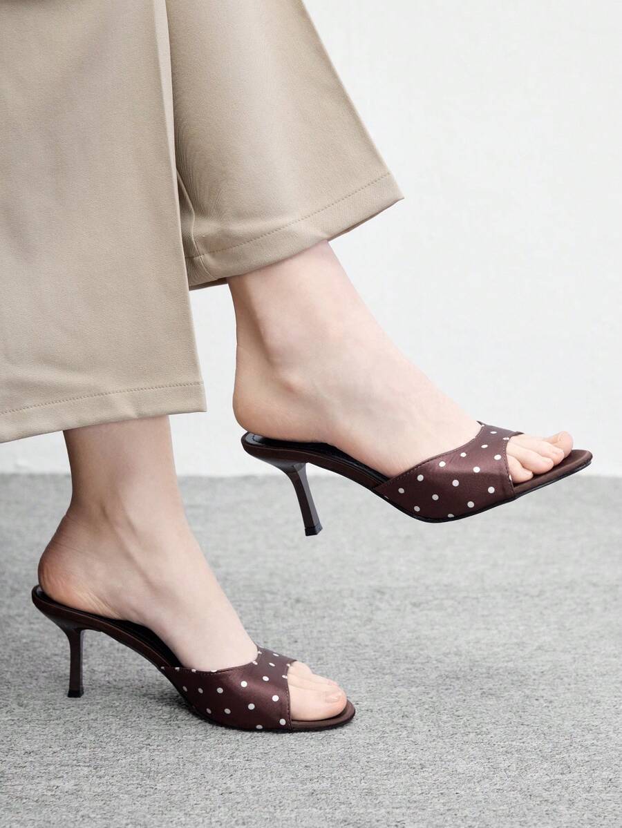 Pair of women's open toe high heel slingback sandals made with smooth PU leather