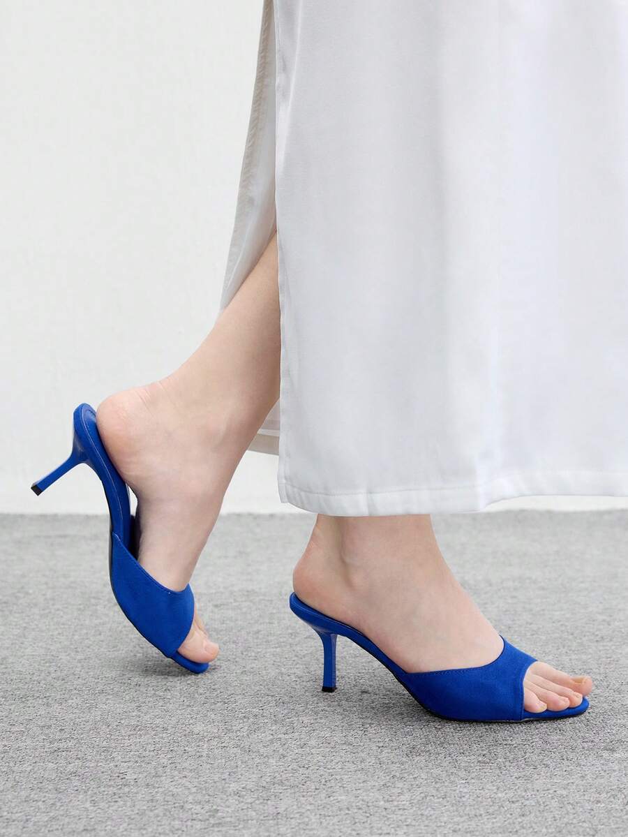 Pair of women's open toe high heel slingback sandals made with smooth PU leather