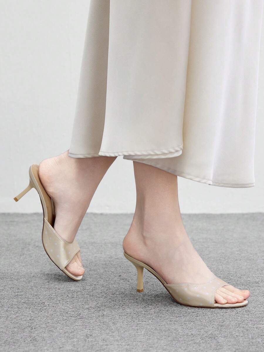 Pair of women's open toe high heel slingback sandals made with smooth PU leather
