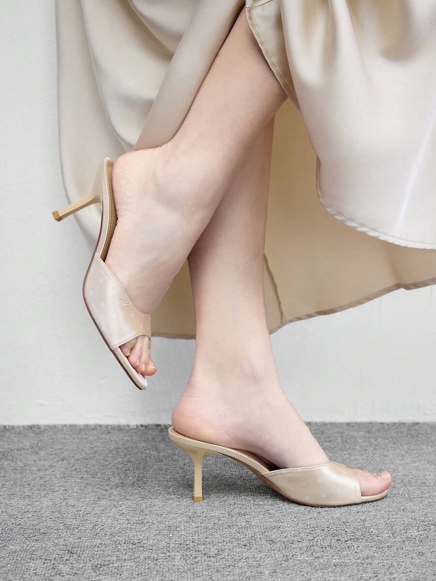 Pair of women's open toe high heel slingback sandals made with smooth PU leather