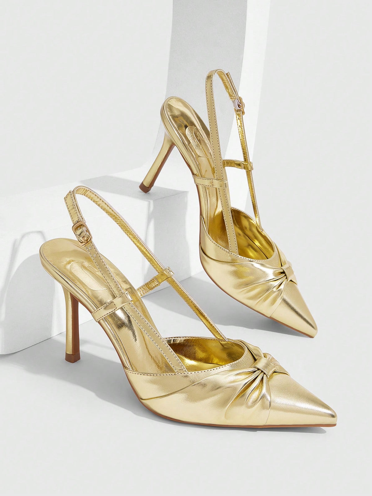 Women's pointed toe high heel slingback shoes featuring a stylish front twist detail, stiletto heel, and adjustable ankle buckle strap.