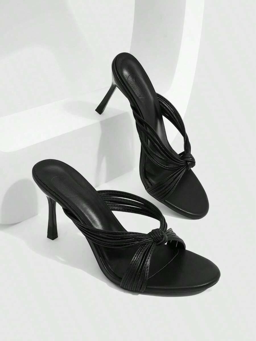 Women's high heel sandals with knotted thin straps, open round toe, and sleek stiletto thin heel.