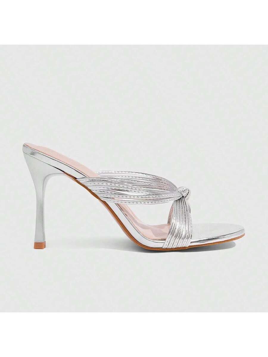 Women's high heel sandals with knotted thin straps, open round toe, and sleek stiletto thin heel.