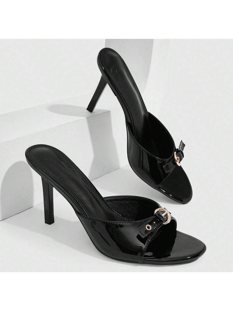 Elegant burgundy high heel slingback sandals with an open toe and round buckle strap.