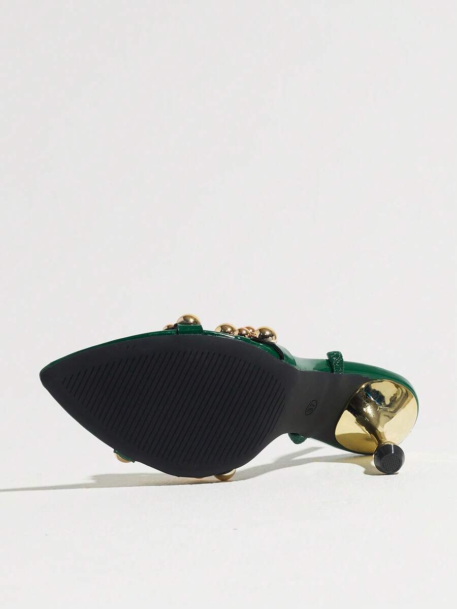 Pointed toe party high heels in gold featuring wavy lace trim, a stiletto heel, and back tie slingback straps.