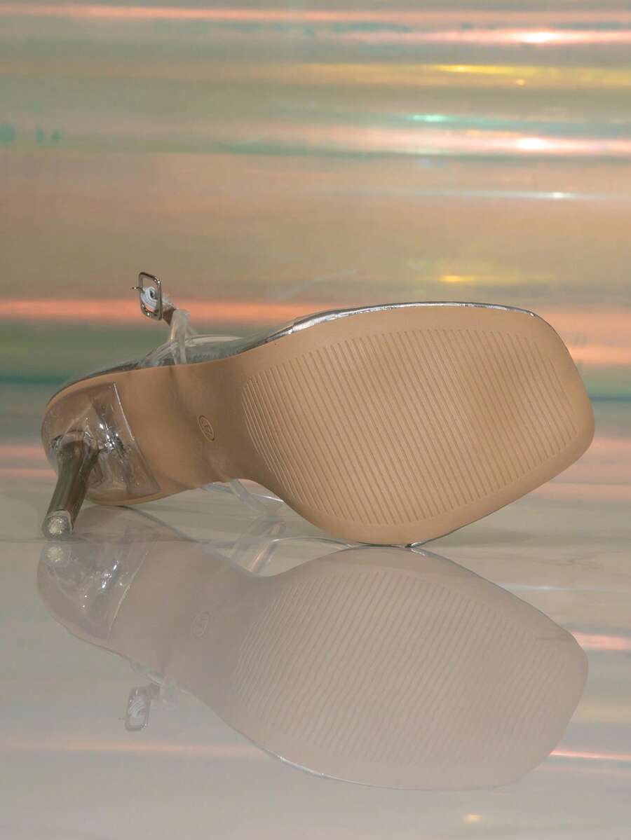 Women's stiletto high heel thong sandals featuring a T-strap toe loop design and ankle buckle strap