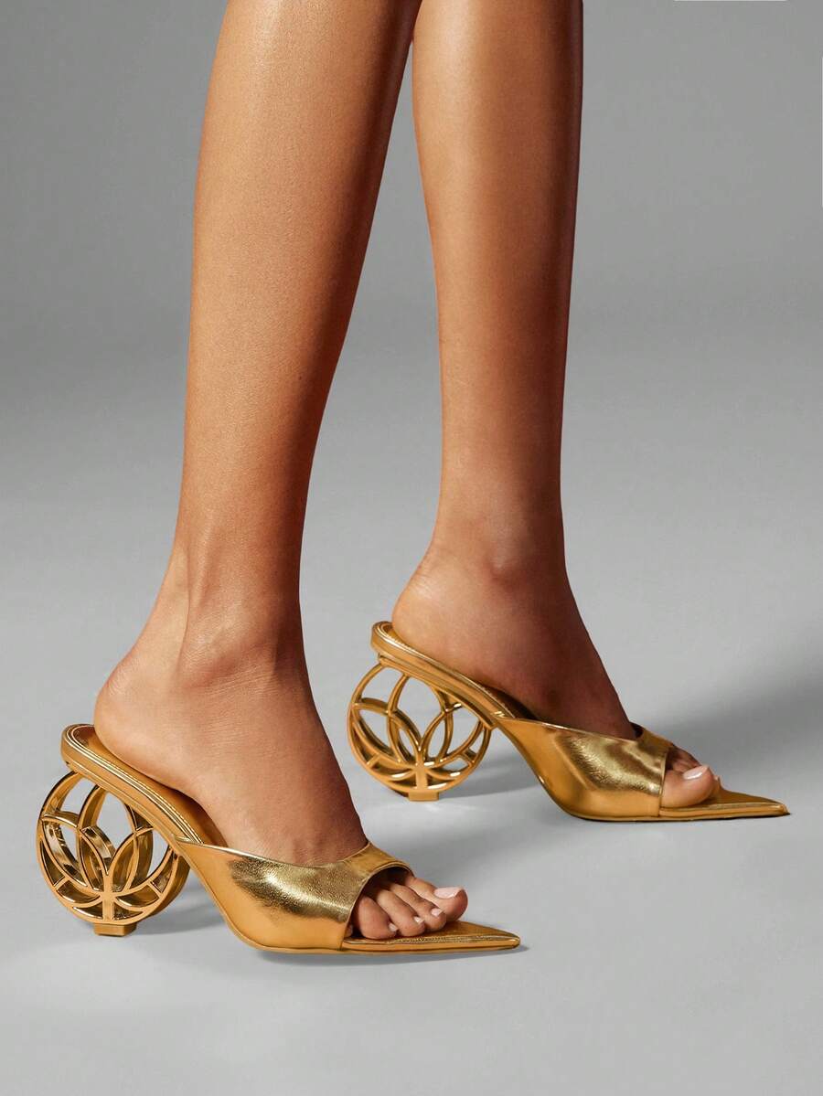 Women's slip-on heeled sandals in gold PU leather featuring a pointed toe and sculptural ball-shaped mid heel.
