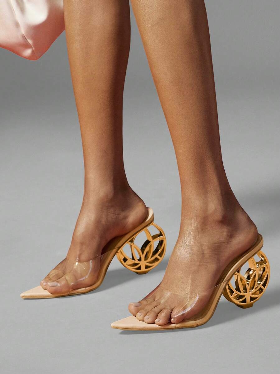 Women's slip-on heeled sandals in gold PU leather featuring a pointed toe and sculptural ball-shaped mid heel.
