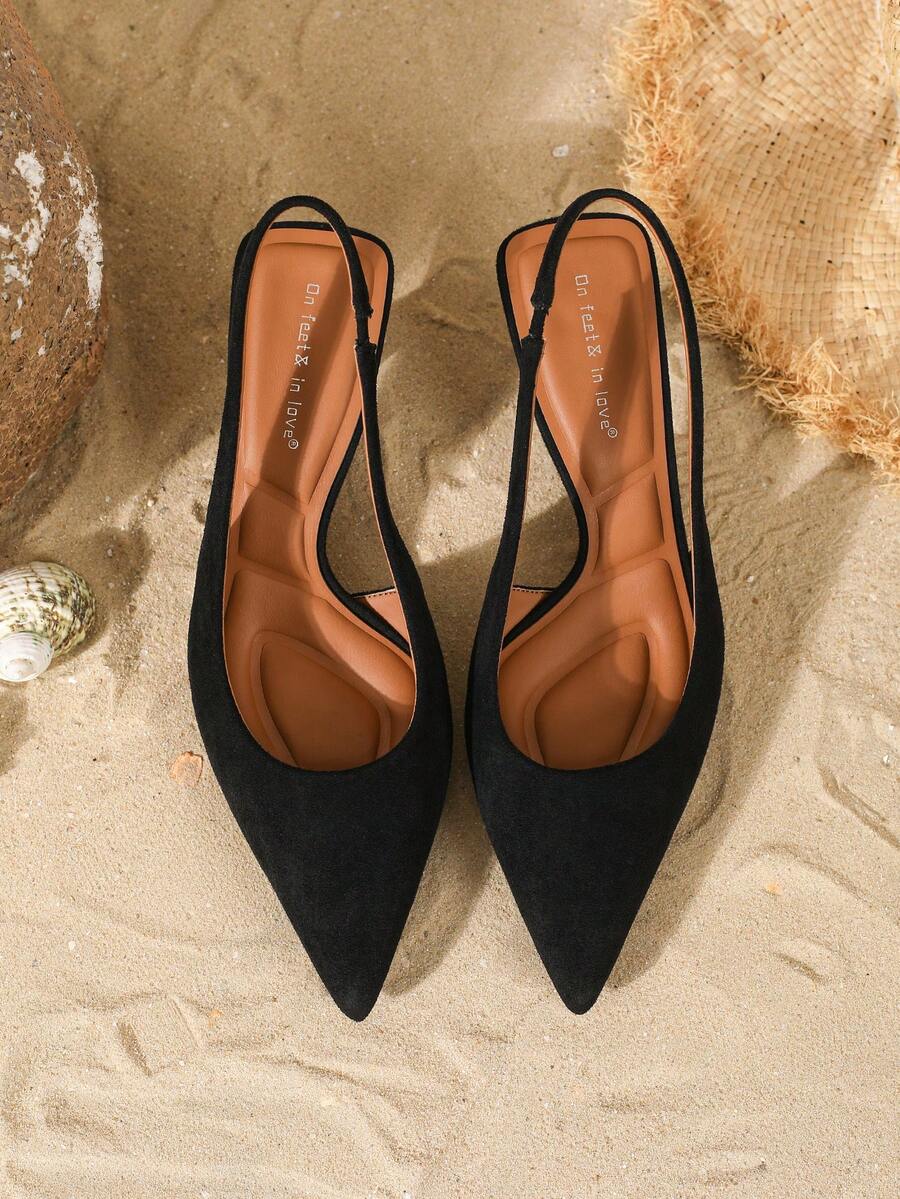Women's elegant velvet kitten heel slingback pumps featuring a pointed closed toe and slip-on strap design.