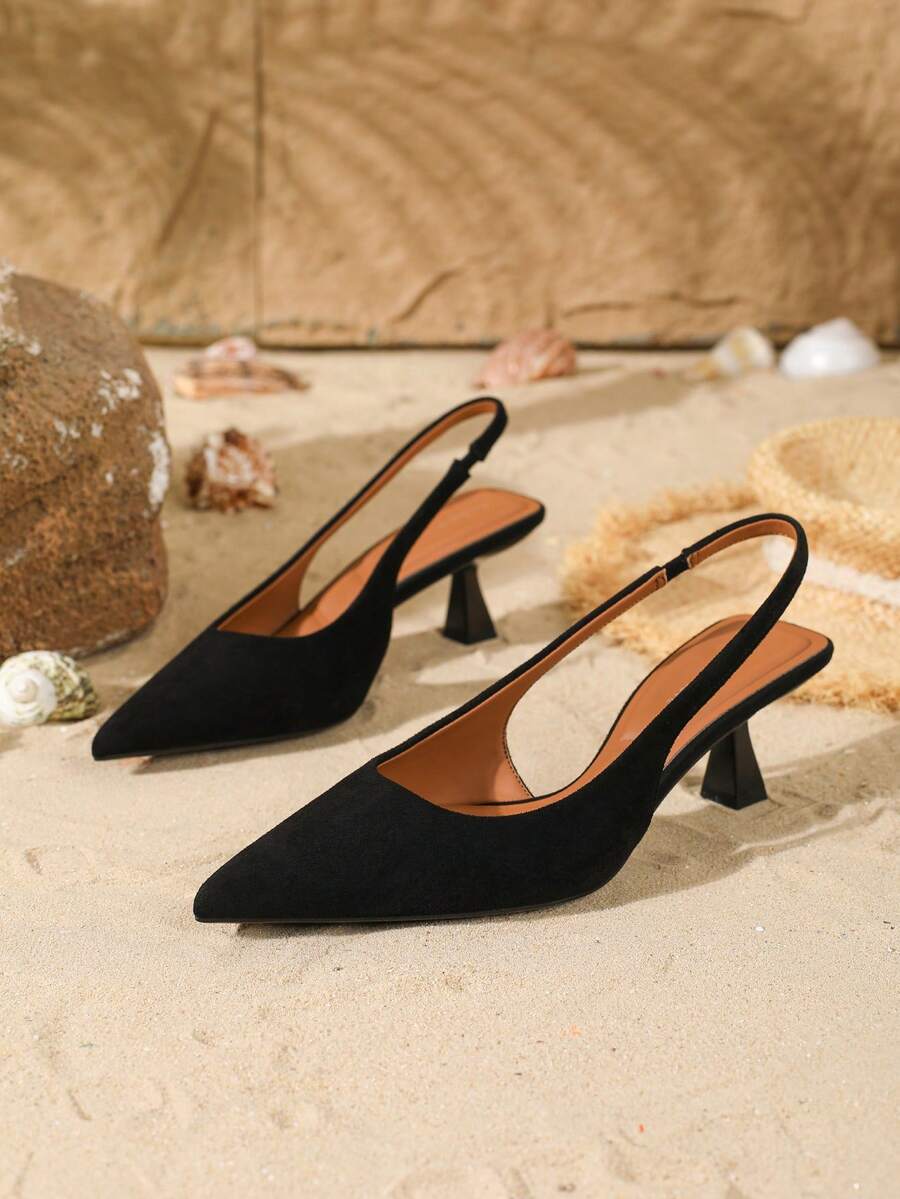 Women's elegant velvet kitten heel slingback pumps featuring a pointed closed toe and slip-on strap design.