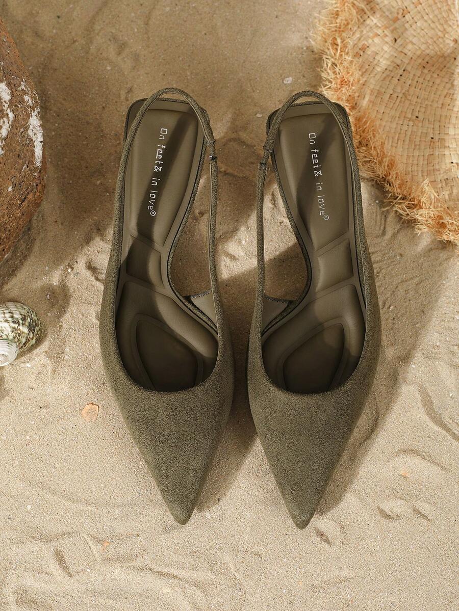 Women's elegant velvet kitten heel slingback pumps featuring a pointed closed toe and slip-on strap design.