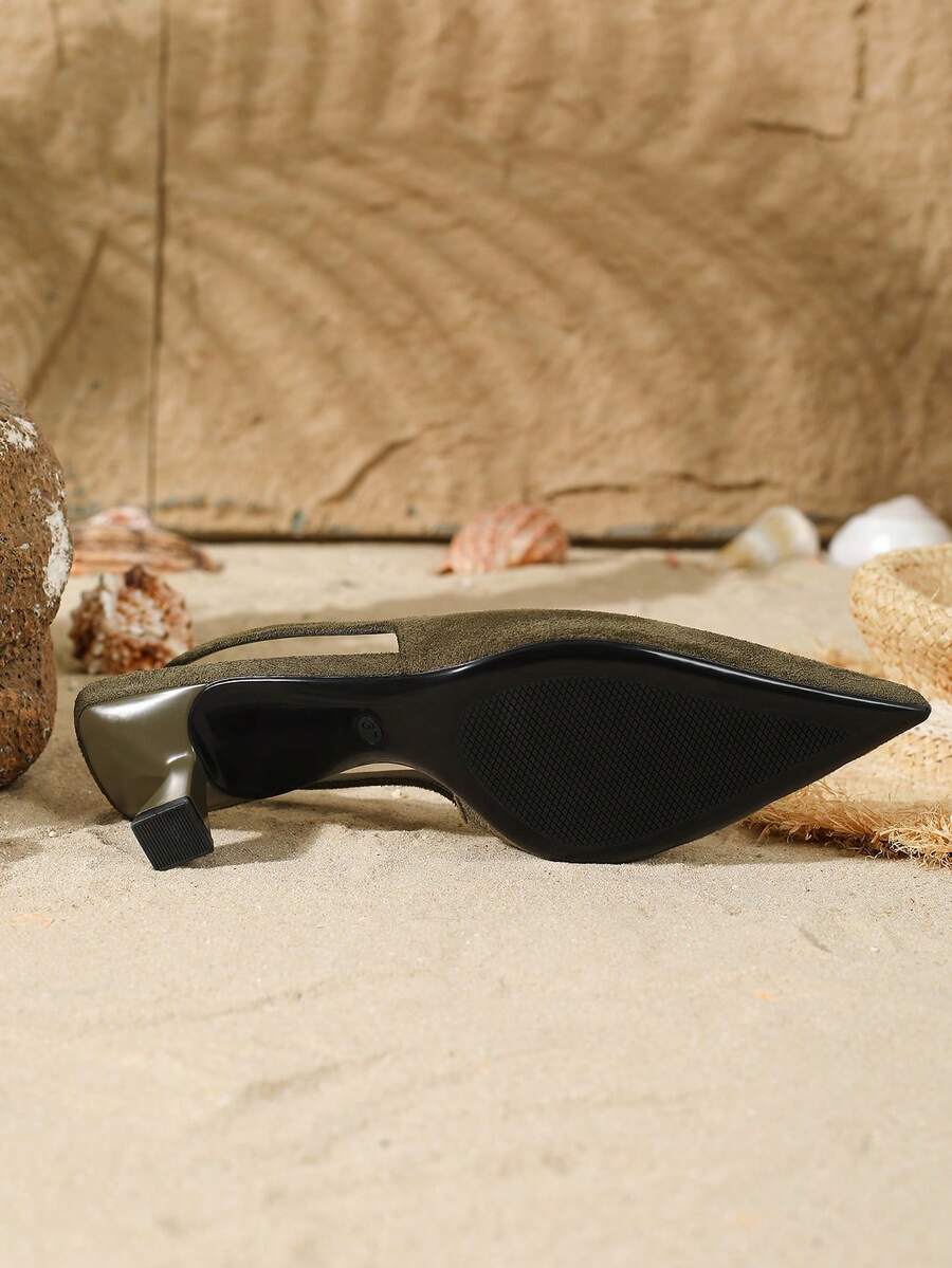 Women's elegant velvet kitten heel slingback pumps featuring a pointed closed toe and slip-on strap design.