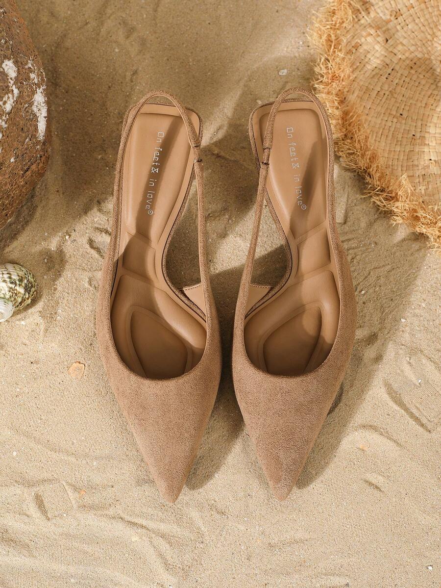 Women's elegant velvet kitten heel slingback pumps featuring a pointed closed toe and slip-on strap design.