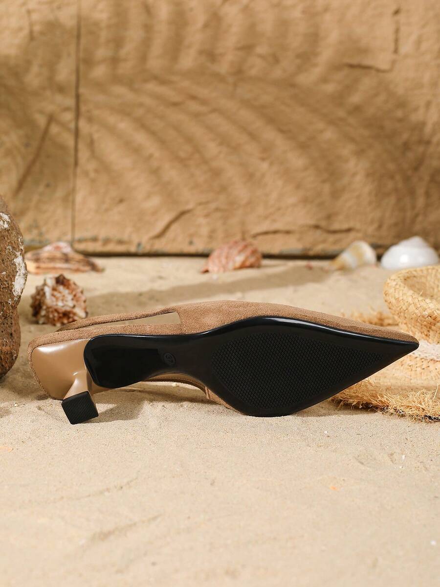 Women's elegant velvet kitten heel slingback pumps featuring a pointed closed toe and slip-on strap design.
