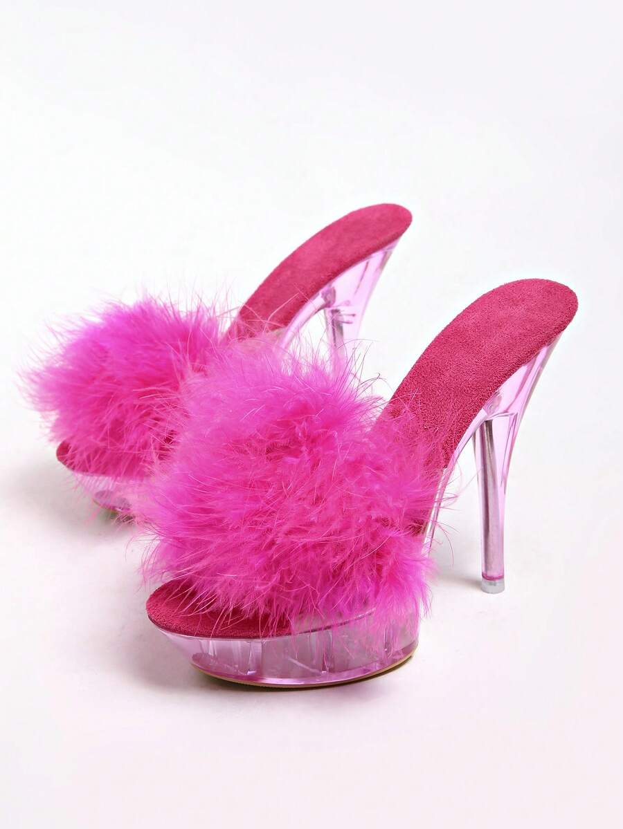 Transparent chunky heel platform slide sandals for women featuring clear PVC upper, open toe design, and ultra high heels.