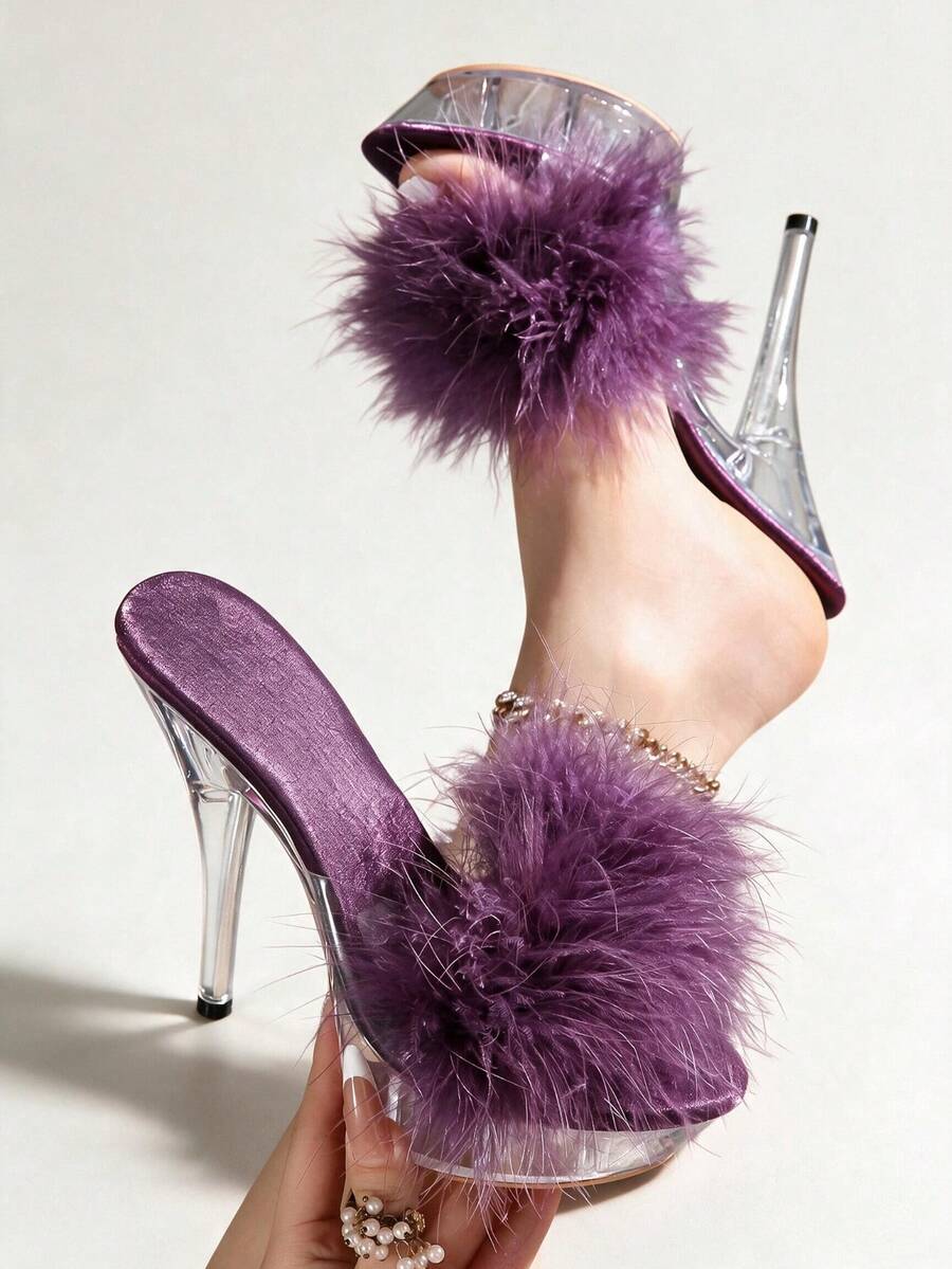 Transparent chunky heel platform slide sandals for women featuring clear PVC upper, open toe design, and ultra high heels.