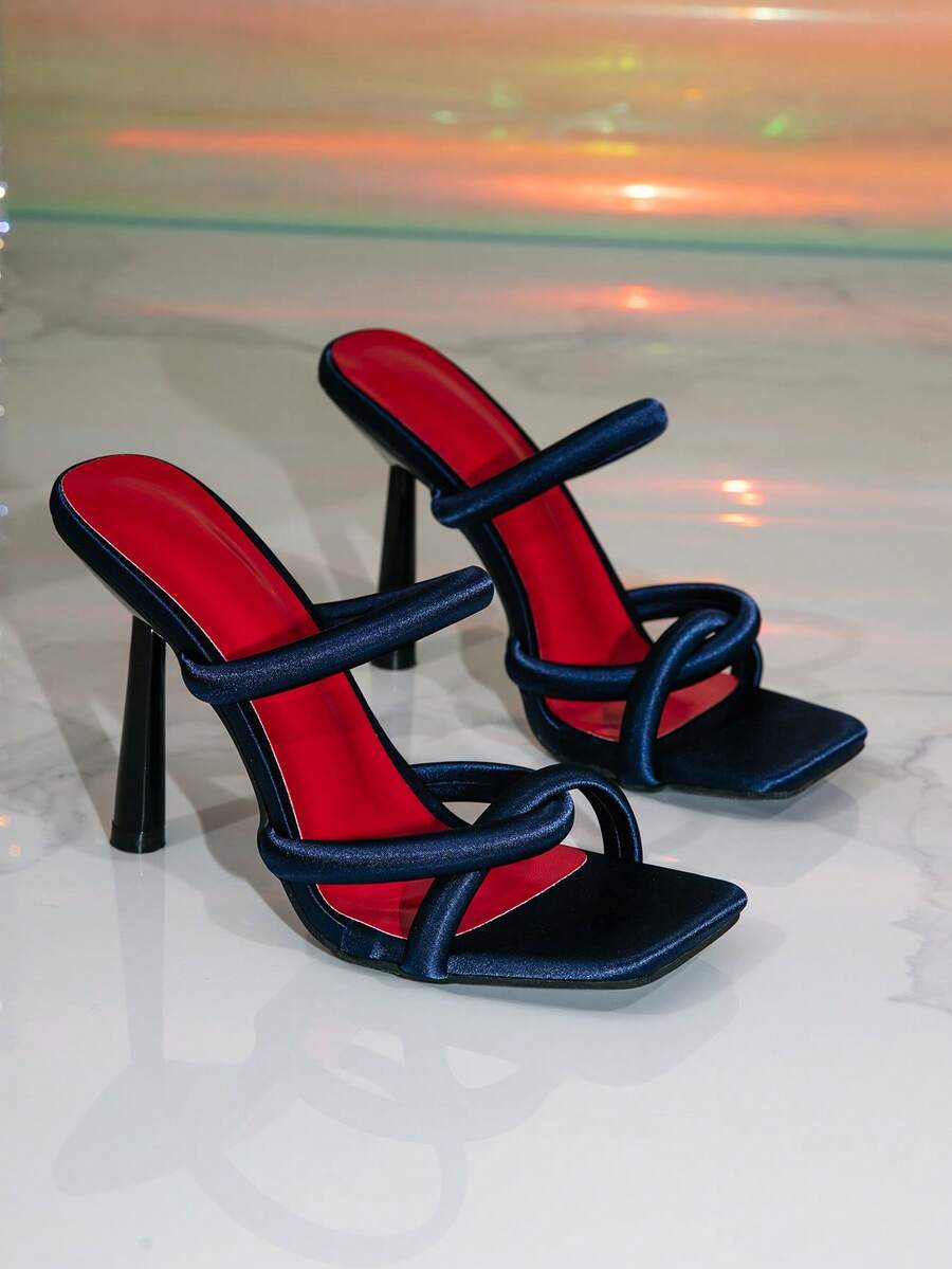 Women's gold open toe high heel mule sandals with pyramid decor and slip on party slide design