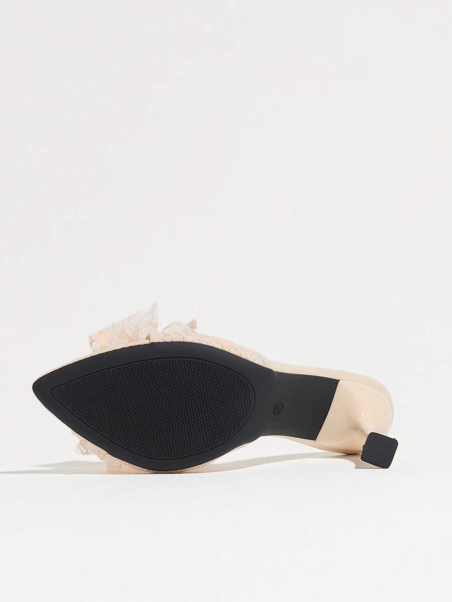Women's pointed toe high heel mule sandals featuring a sleek slip-on design with elegant lace embroidery detailing