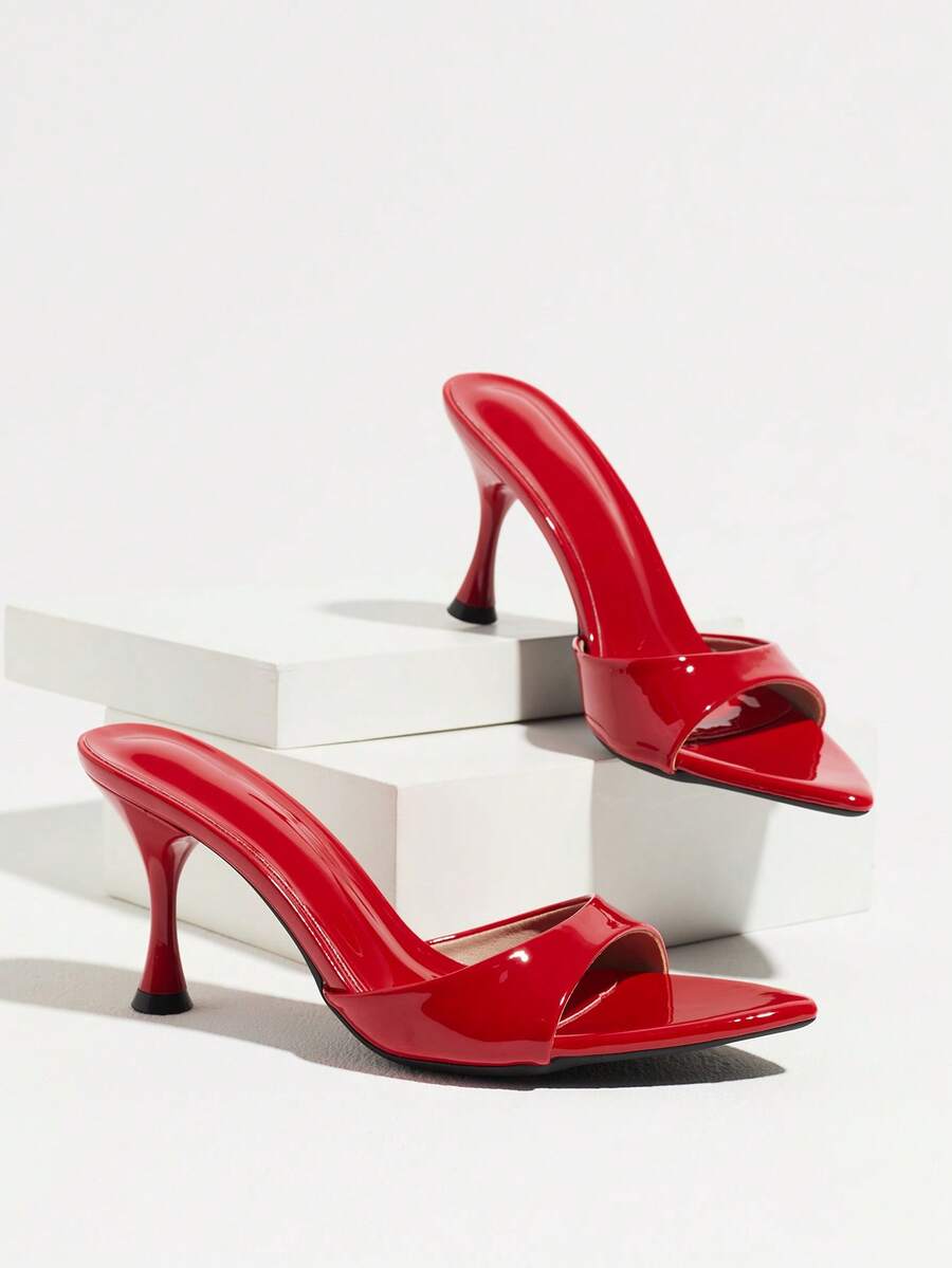 Women's open pointed toe stiletto mule high heel sandals featuring a glossy slip-on design.