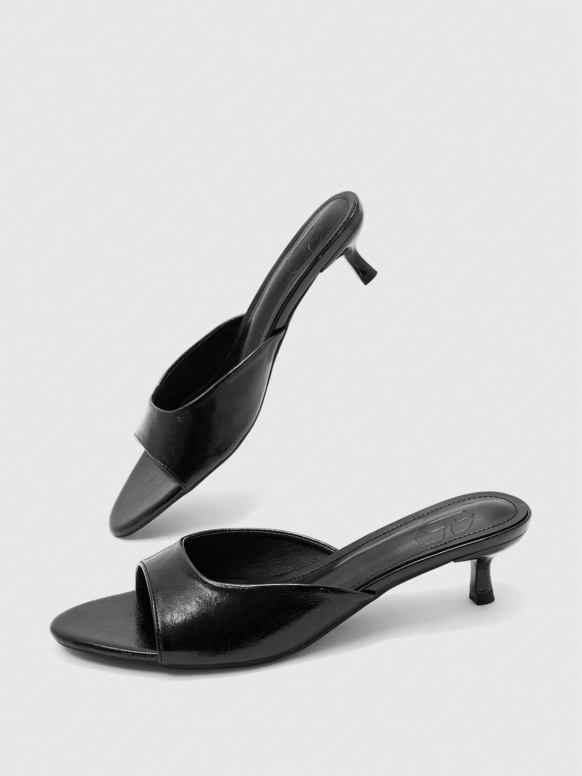 Pair of women's open toe high heel slingback sandals made with smooth PU leather