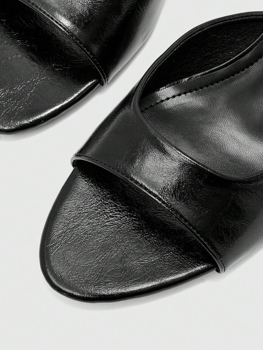 Pair of women's open toe high heel slingback sandals made with smooth PU leather