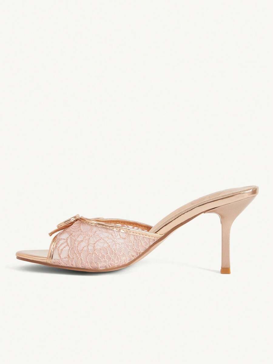 Open toe high heel slide sandals featuring lace details and a bow accent on the upper strap.