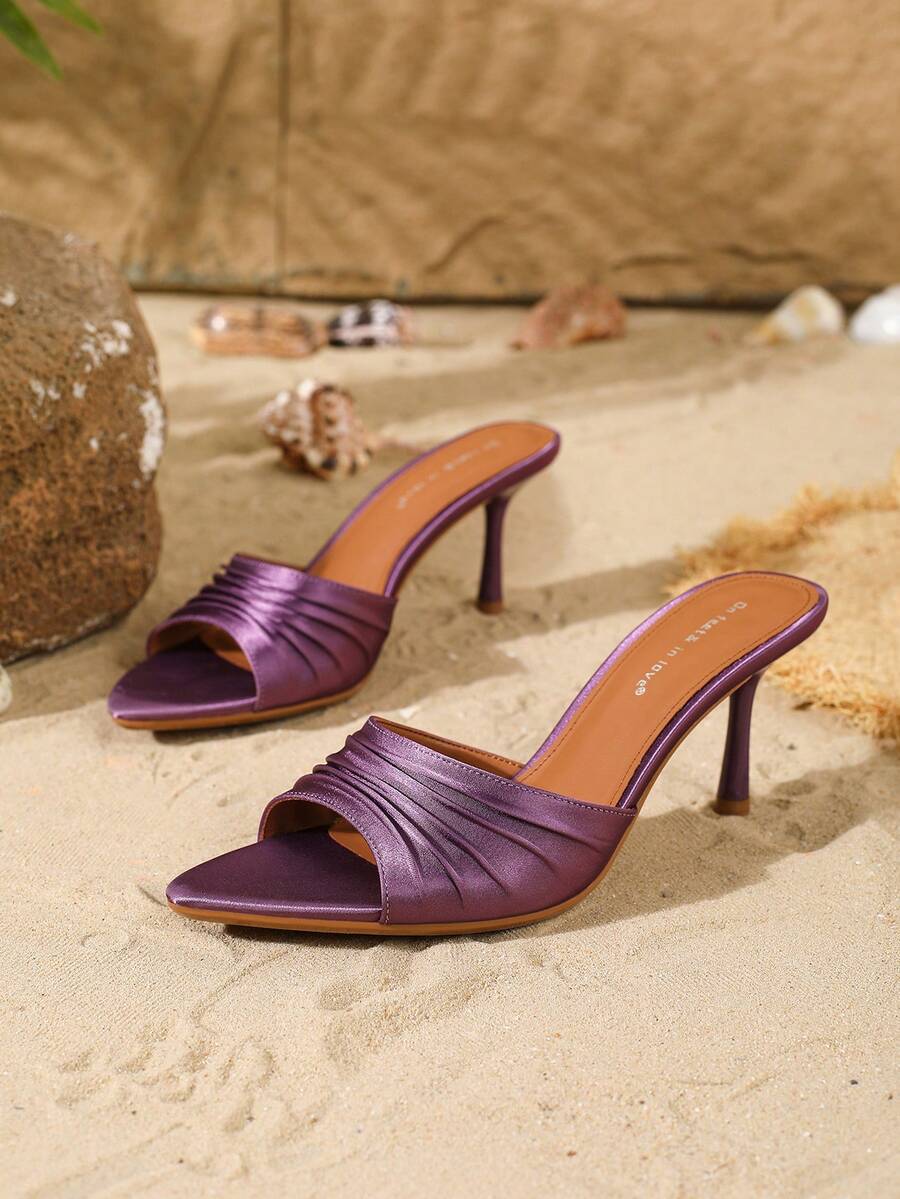 Women's open toe slip-on stiletto heel sandals featuring pleated satin design.