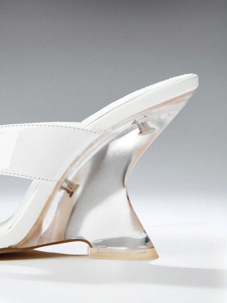 Women's slip-on thong strap wedge sandals featuring a high wedge heel and smooth PU leather upper.