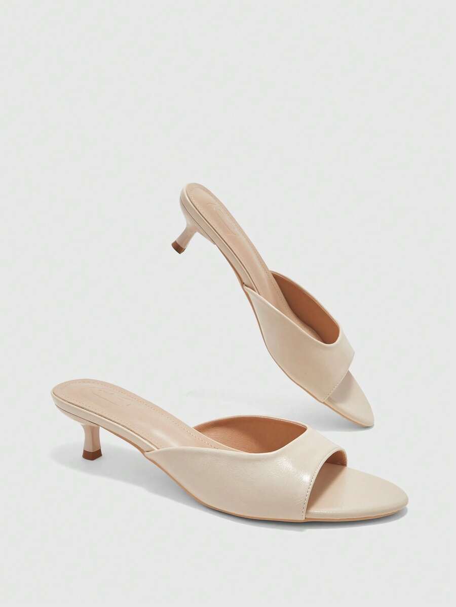 Pair of women's open toe high heel slingback sandals made with smooth PU leather