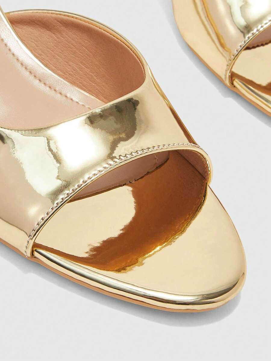 Pair of women's open toe high heel slingback sandals made with smooth PU leather