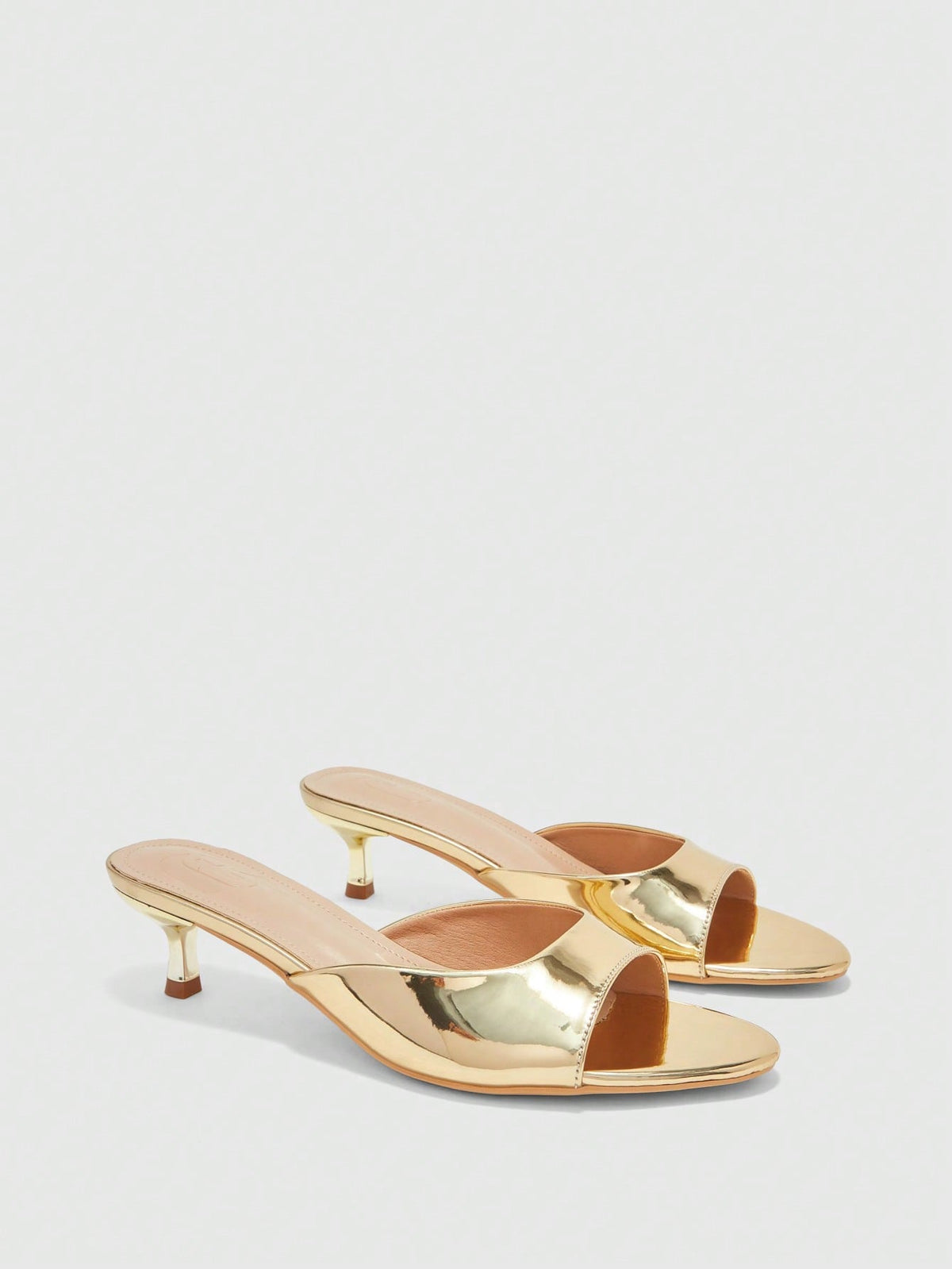 Pair of women's open toe high heel slingback sandals made with smooth PU leather