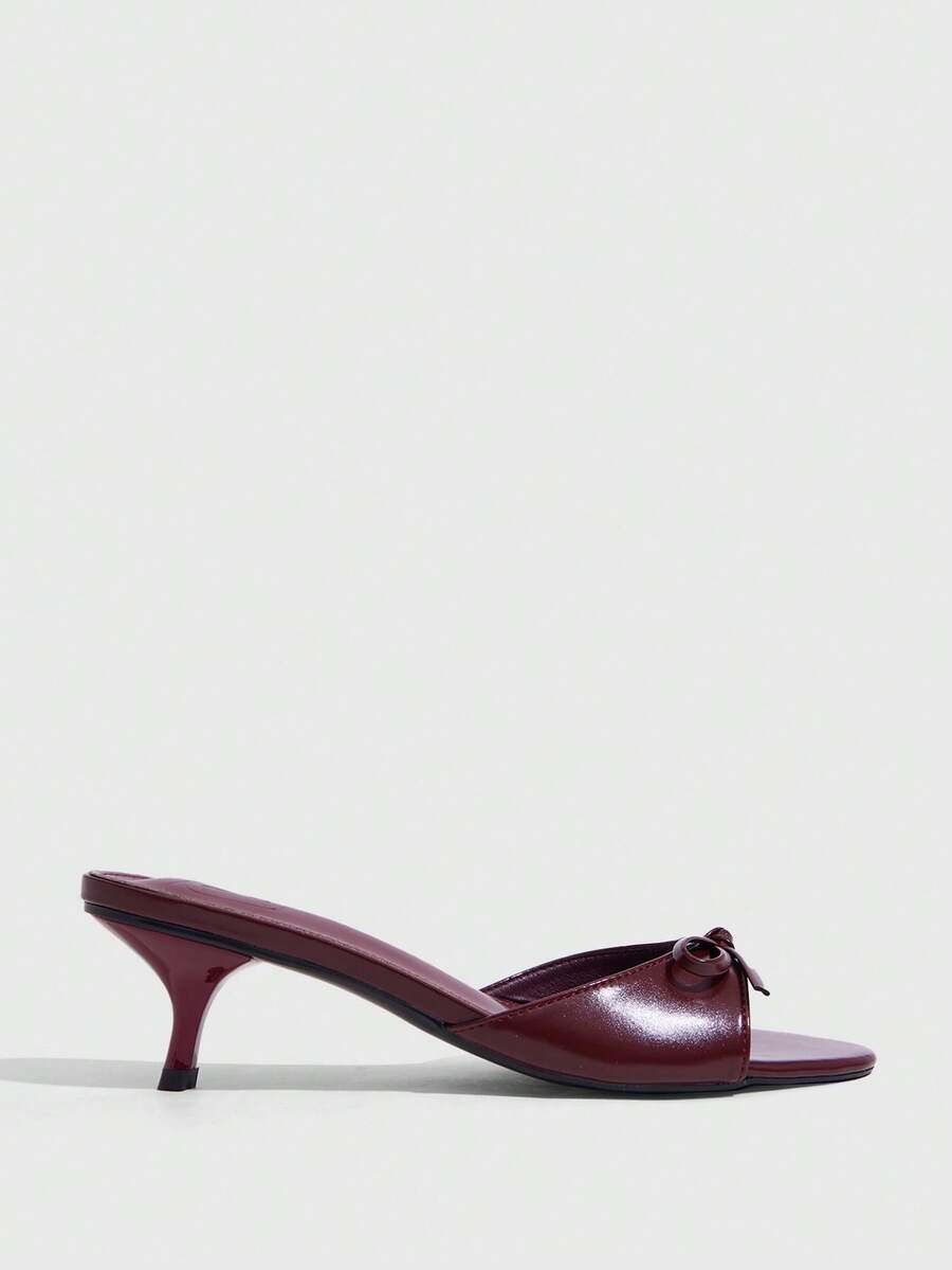 Burgundy high heel sandals for women featuring an open toe, decorative bow, 5.5cm kitten heel, and slingback strap.