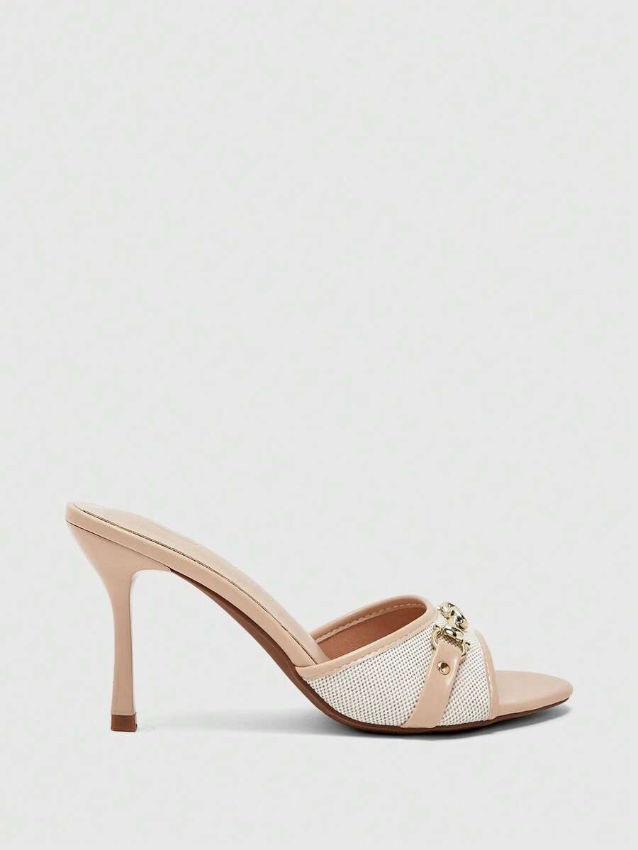 Women's beige high heel mule sandals with open round toe and metal chain detail