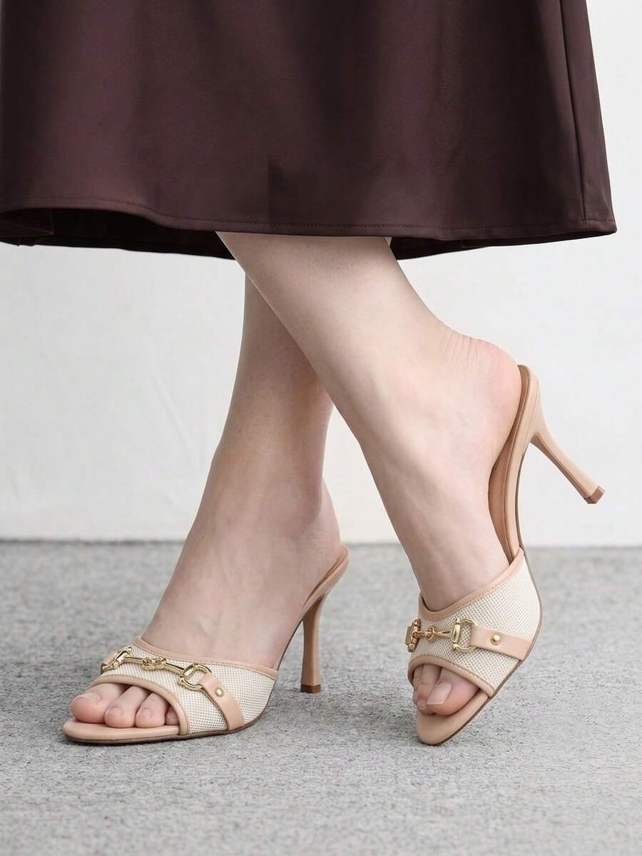 Women's beige high heel mule sandals with open round toe and metal chain detail