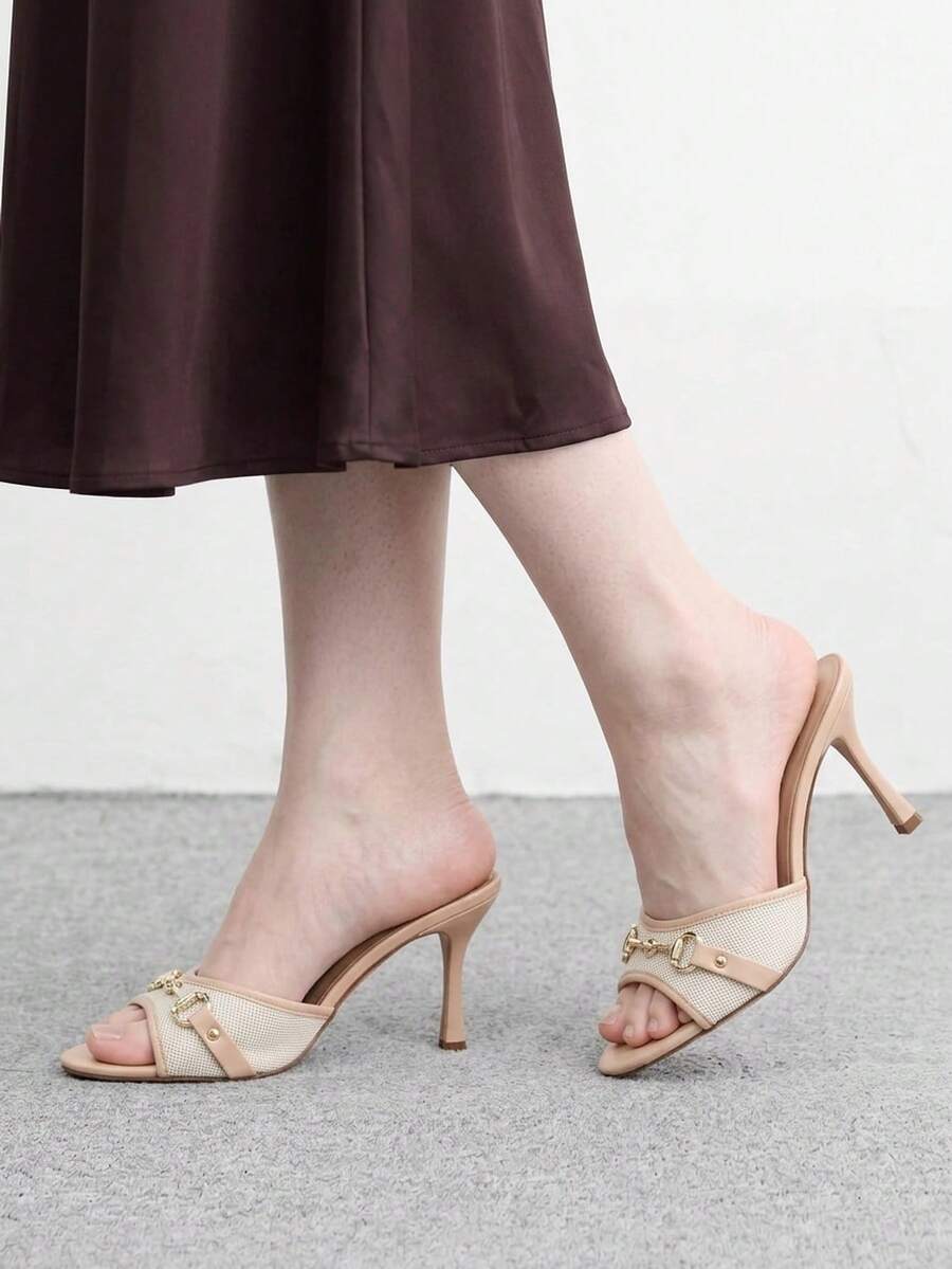 Women's beige high heel mule sandals with open round toe and metal chain detail