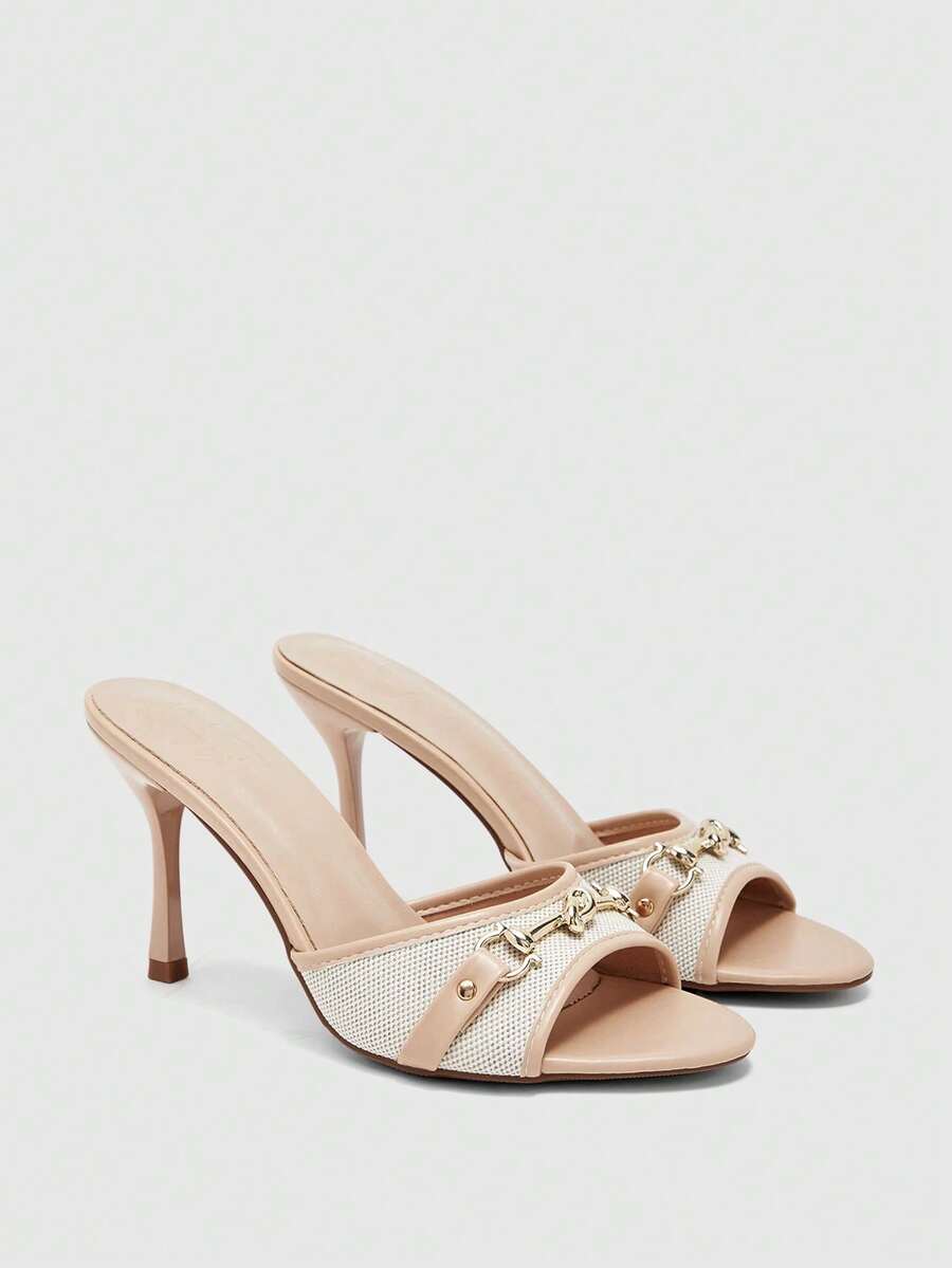 Women's beige high heel mule sandals with open round toe and metal chain detail