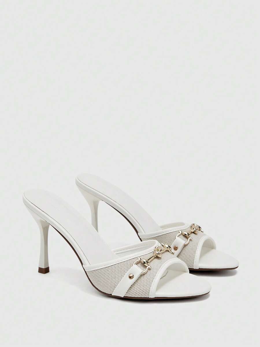 Women's beige high heel mule sandals with open round toe and metal chain detail